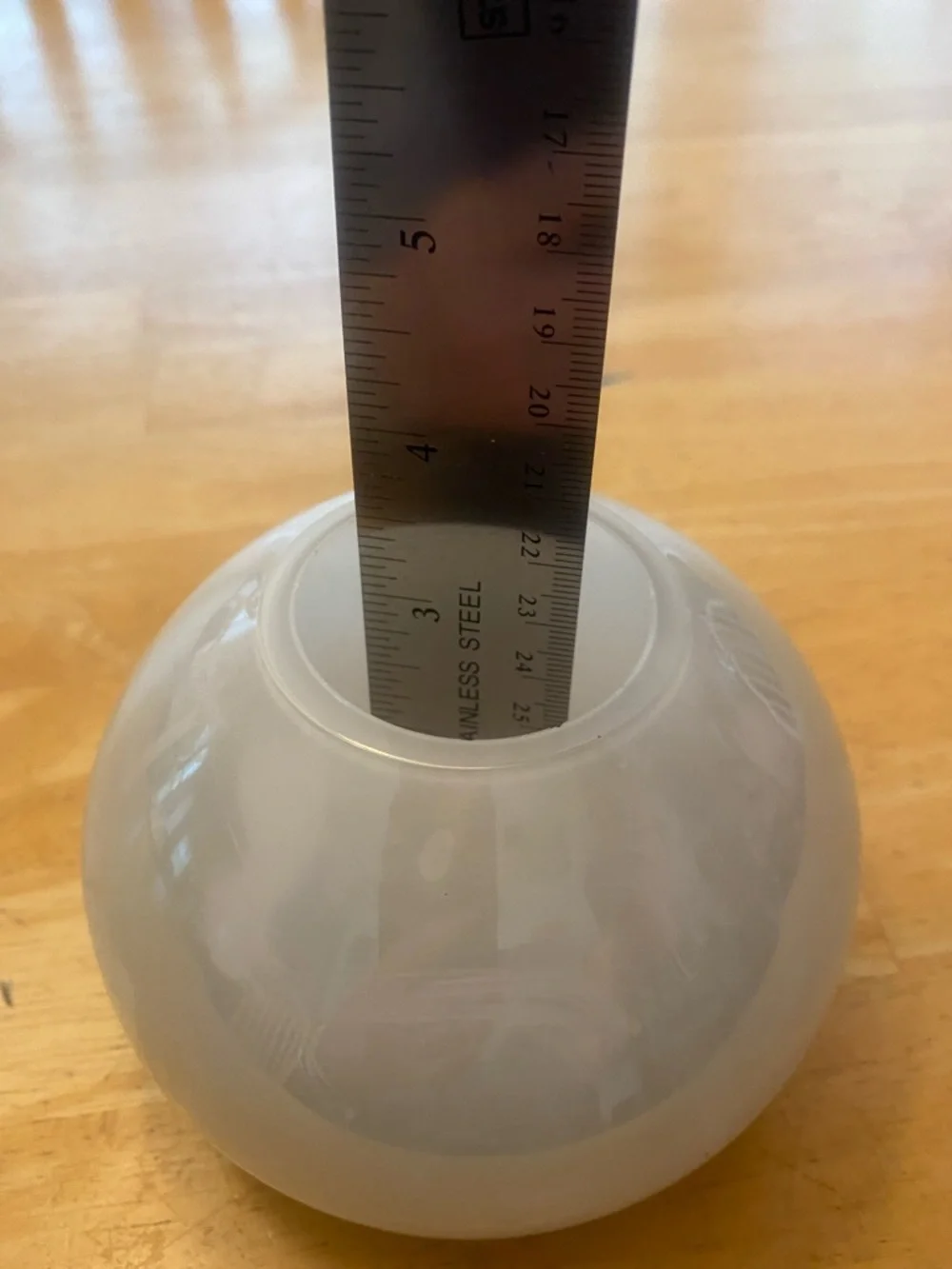 Crate & Barrel Pearlized light green glass globe vase about 5x3